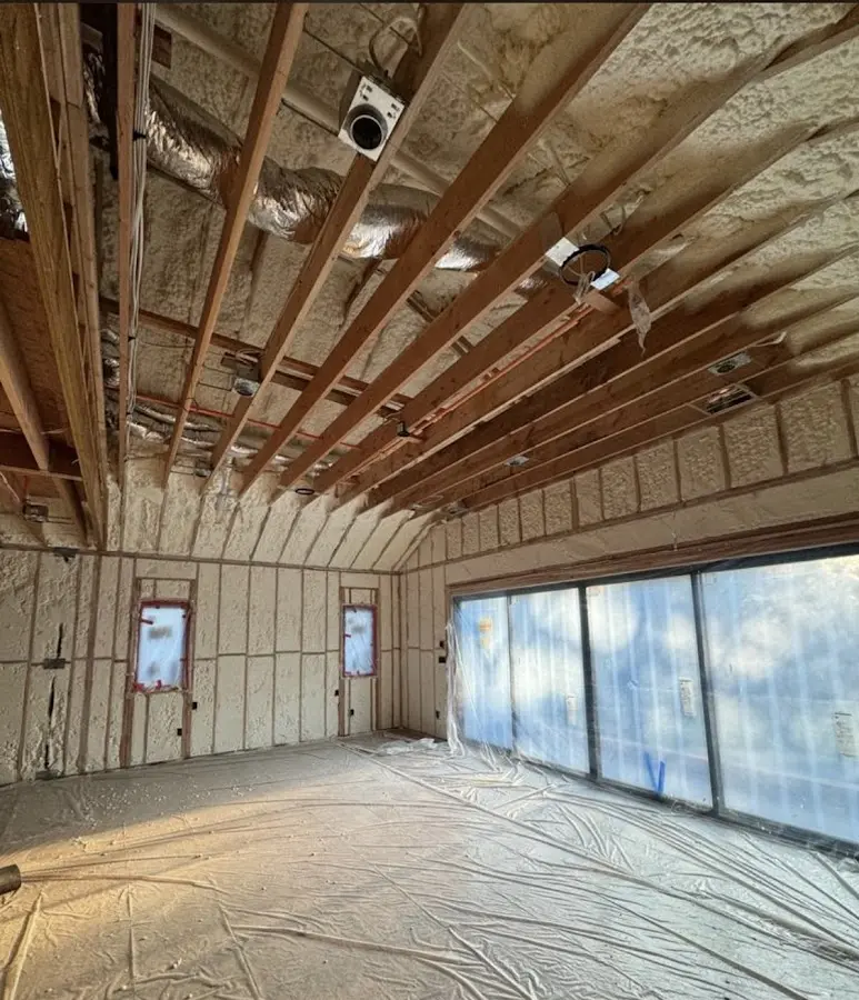 Interior walls and ceiling insulated with spray foam during new construction in Oakwood